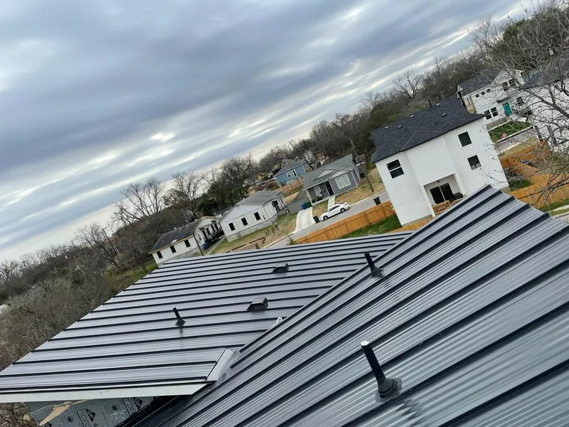 Standing seam metal roof panels with vents for Skylight Repair in Crossville